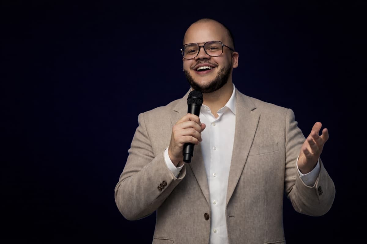Kevin Cintron speaking on stage